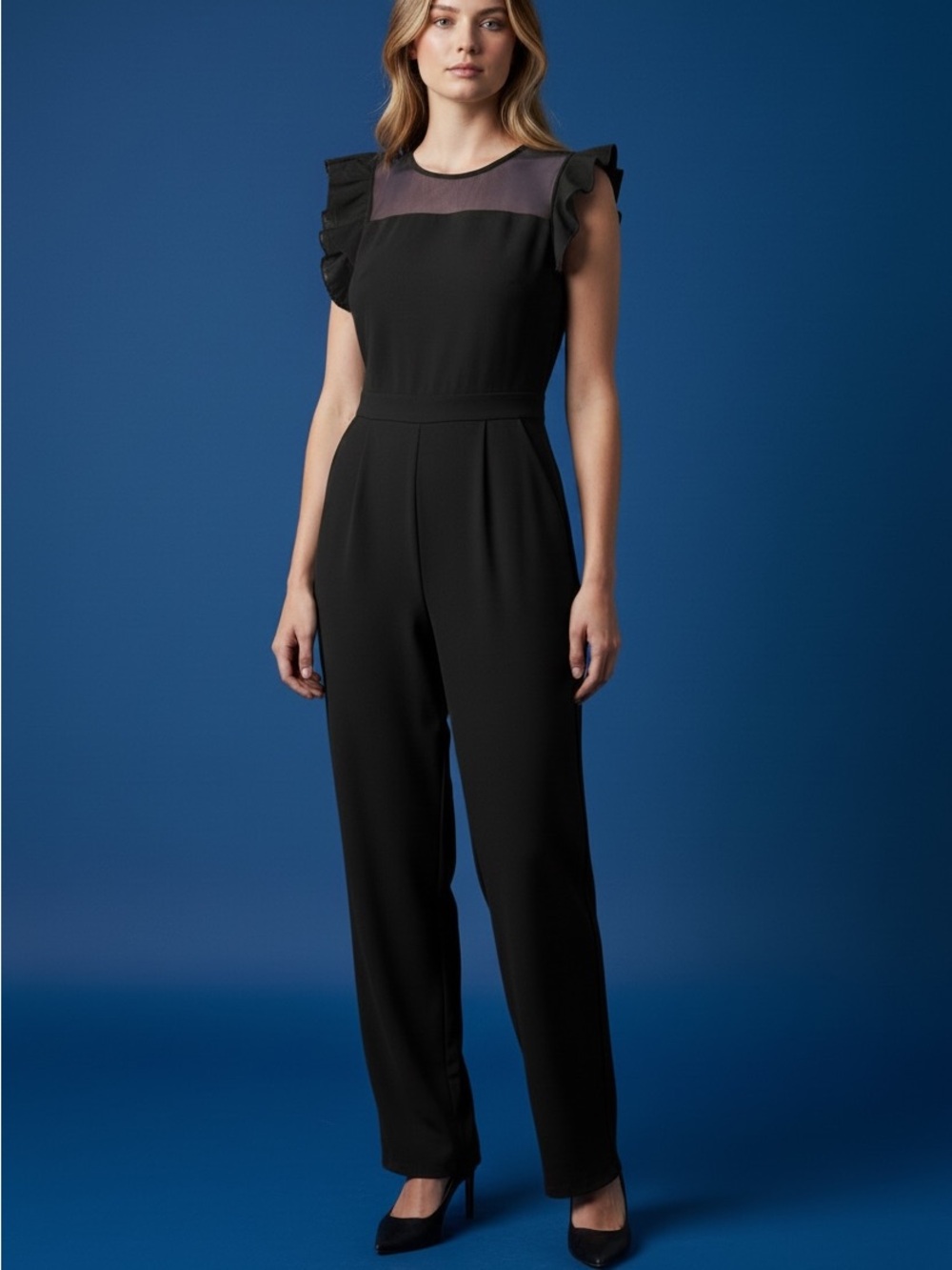 Black Ruffle-Sleeve Jumpsuit - fabric is light and stretchy.
